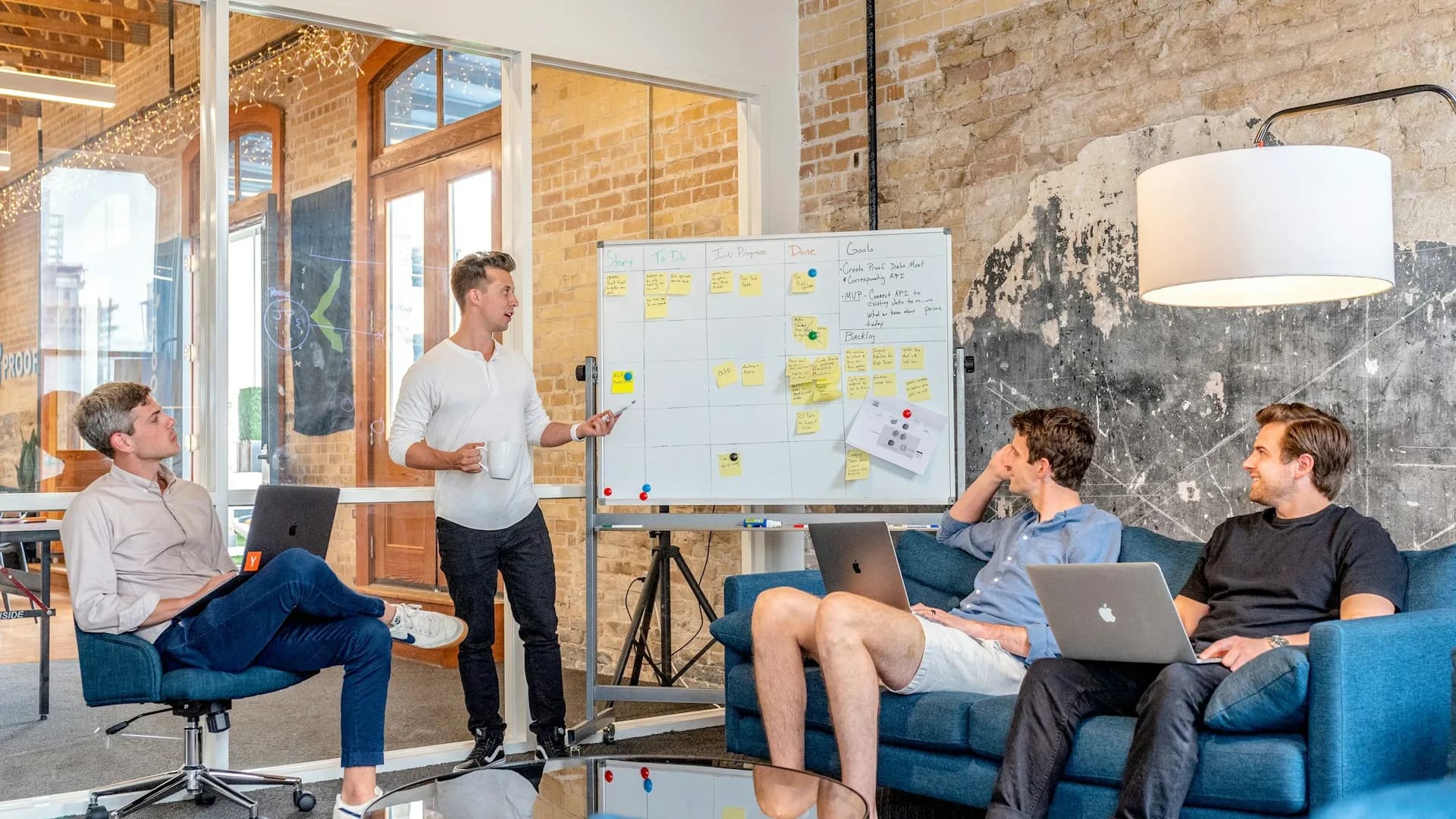 Creative social media team analyzing digital campaign reach and engagement